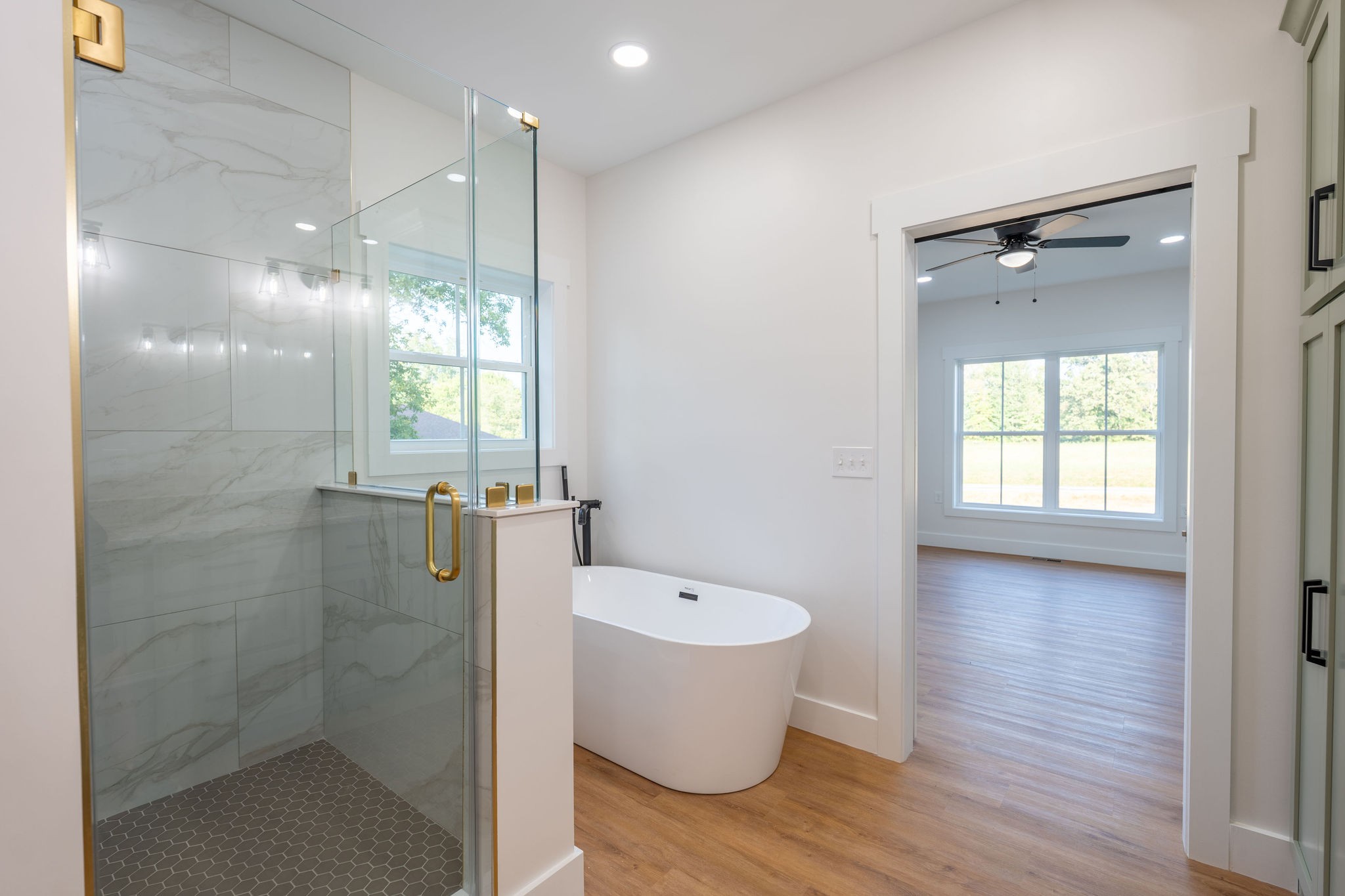 1166 Dugout Road Summertown, TN 38483 - Photo 15 of 24 a bathroom with a toilet a sink and mirror