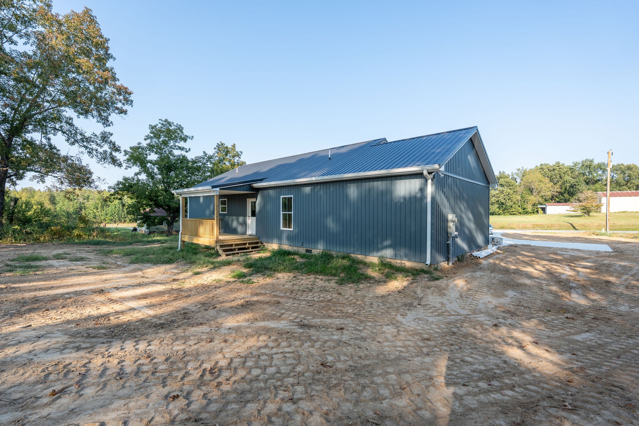 1166 Dugout Road Summertown, TN 38483 - Photo 23 of 24 a view of a house with backyard and trees