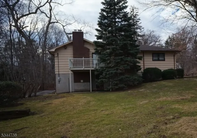 a view of a house with a garden