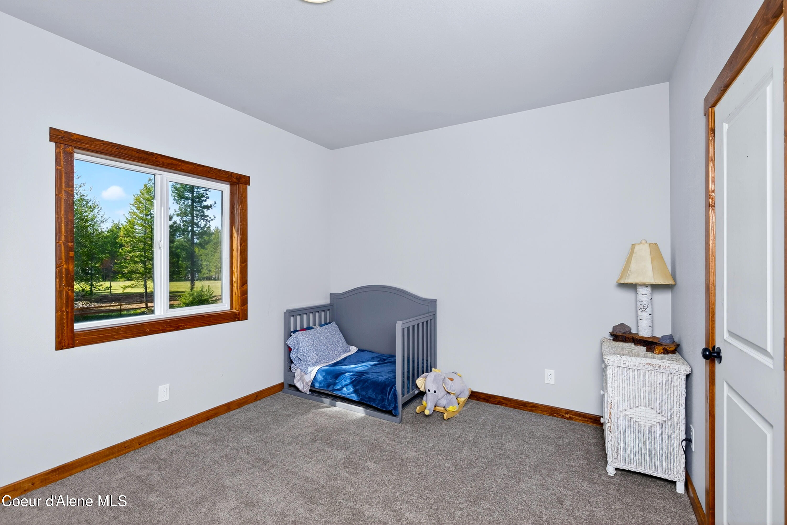 334 Hardy Loop Bonners Ferry, ID 83805 - Photo 15 of 33 014_Nursery_Bedroom_Window_View