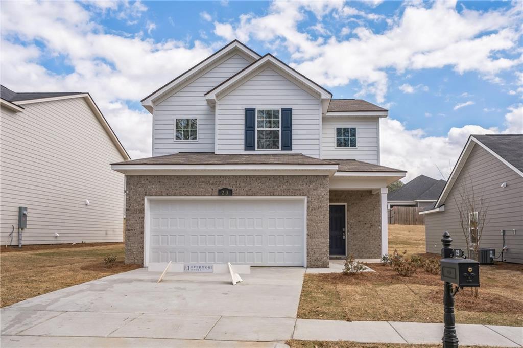 23 Whiterock Road Phenix City, AL 36869 - Photo 26 of 29 Traditional home with a shingled roof, central air condition unit, an attached garage, driveway, and brick siding