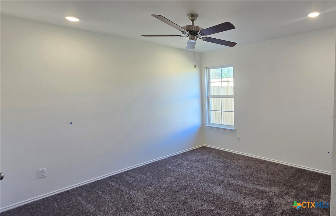 342 Monty Road Copperas Cove, TX 76522 - Photo 9 of 15 an empty room with a window and a fan