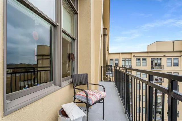 a view of a bathroom with wooden floor