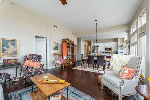 a living room with furniture and a table