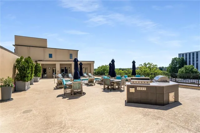 a view of a patio with swimming pool