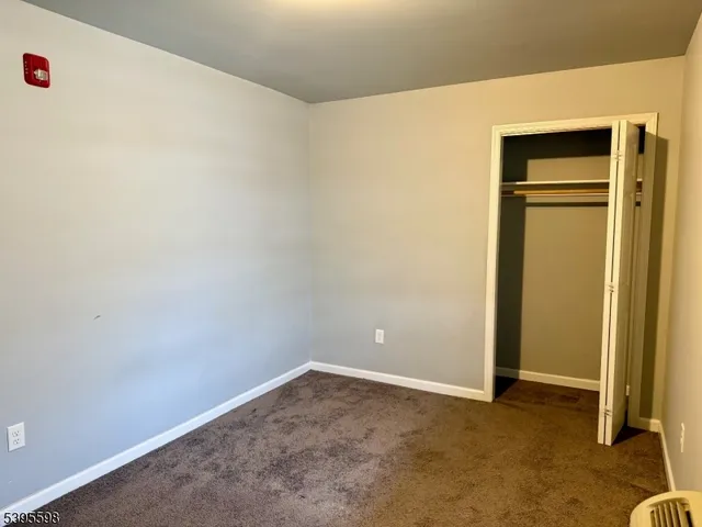 an empty room with closet