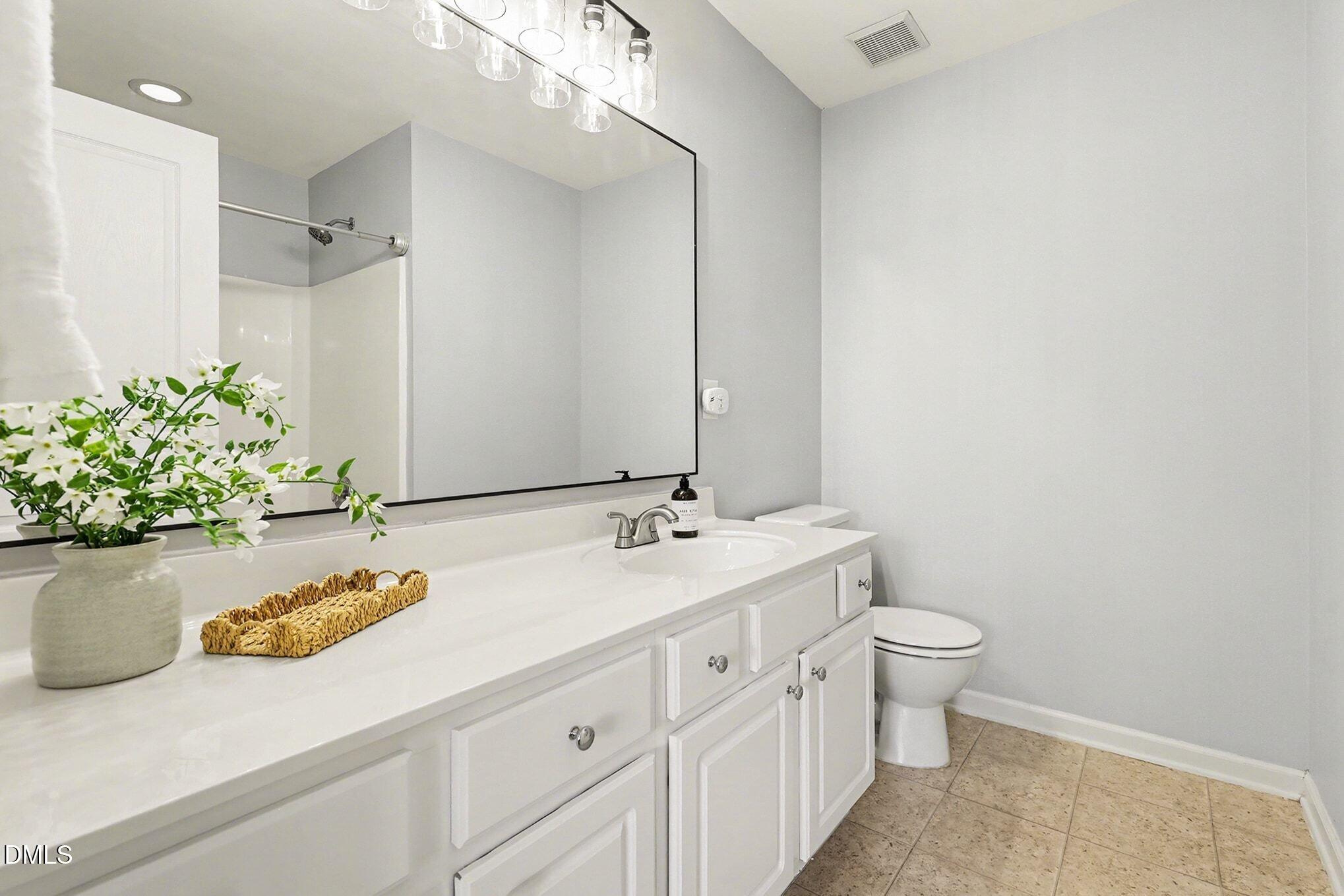 7632 Winners Edge Street Raleigh, NC 27617 - Photo 13 of 17 Primary Bath 1