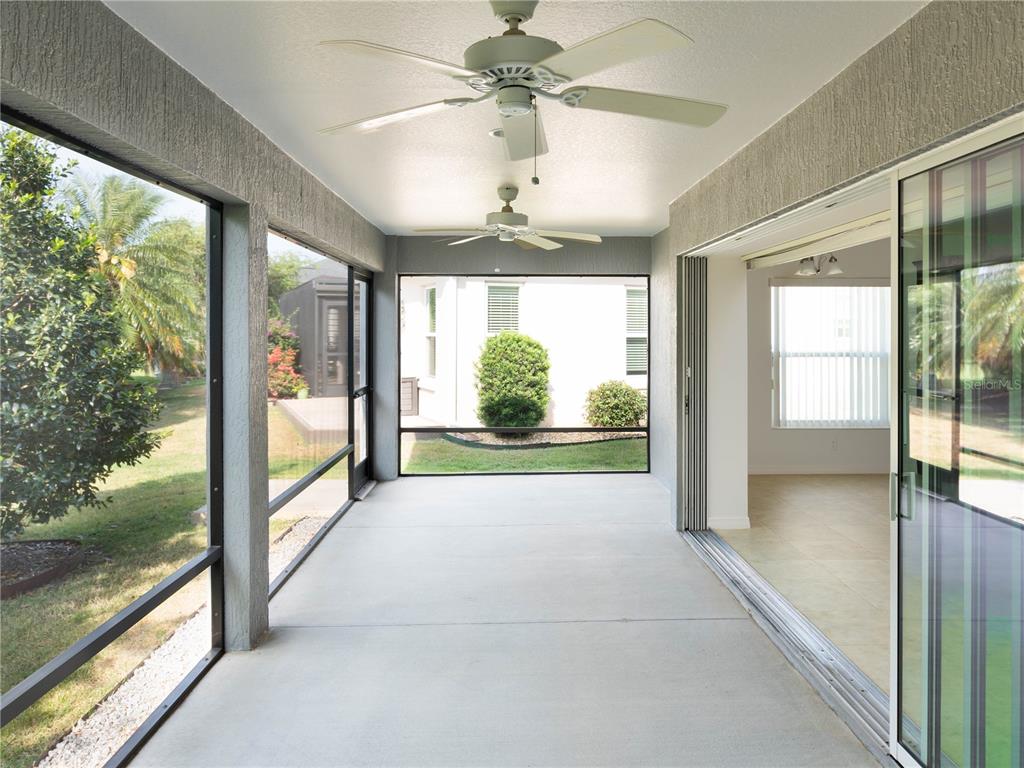 3942 Zenith Loop The Villages, FL 32163 - Photo 16 of 31 a view of livingroom with furniture and door
