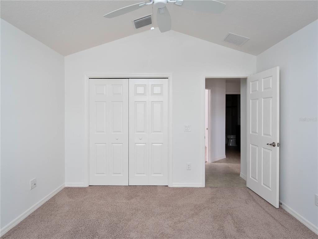 3942 Zenith Loop The Villages, FL 32163 - Photo 24 of 31 an empty room with closet