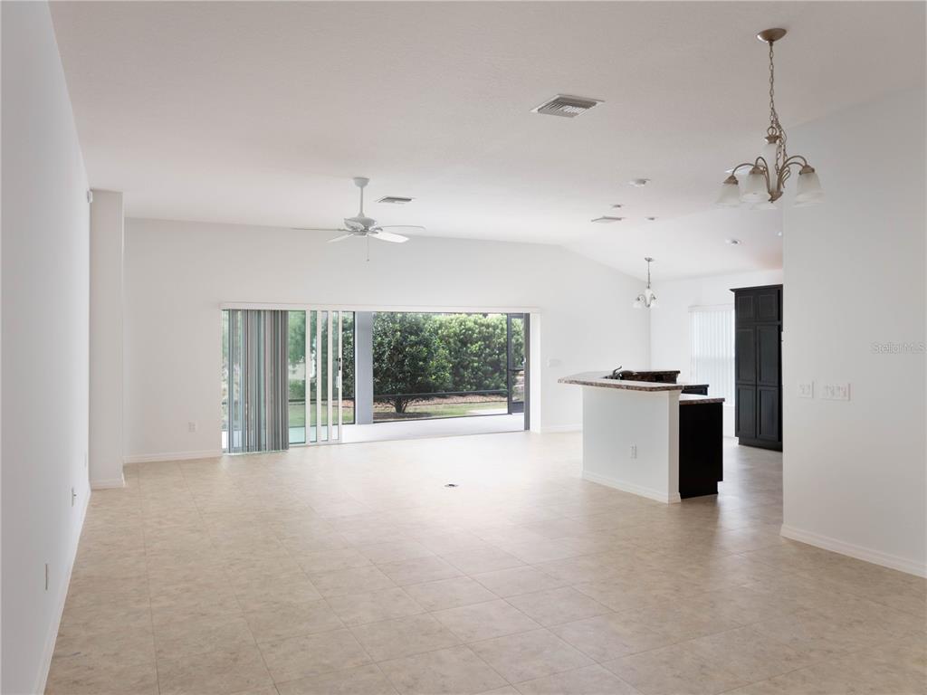 3942 Zenith Loop The Villages, FL 32163 - Photo 7 of 31 a view of a kitchen with a sink and a window