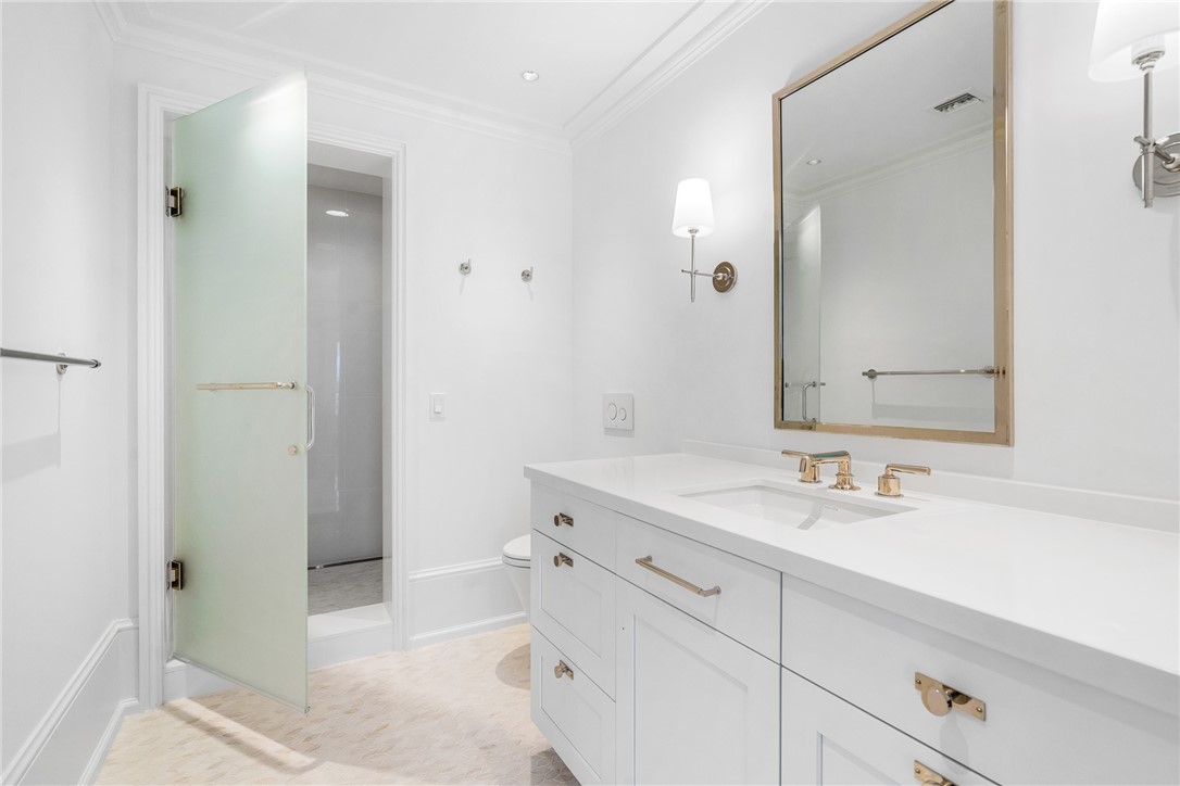 800 Beach Road, Unit 372 Indian River Shores, FL 32963 - Photo 16 of 35 a bathroom with a sink and a mirror