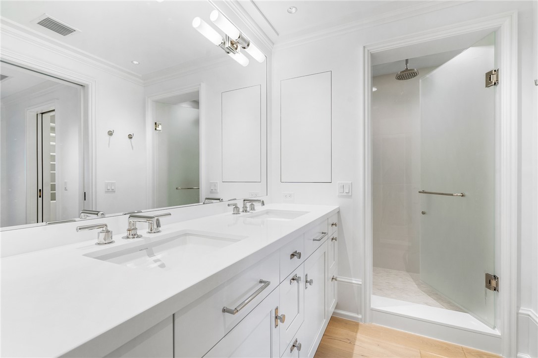 800 Beach Road, Unit 372 Indian River Shores, FL 32963 - Photo 17 of 35 a bathroom with a shower sink and mirror