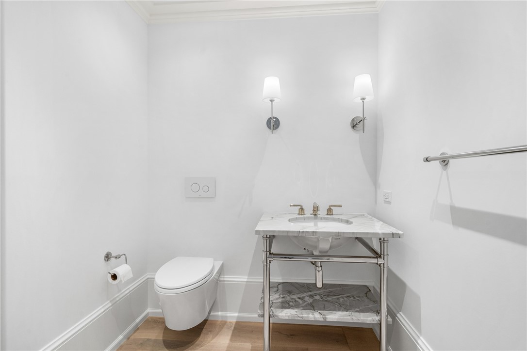 800 Beach Road, Unit 372 Indian River Shores, FL 32963 - Photo 23 of 35 a bathroom with a sink a toilet and a mirror
