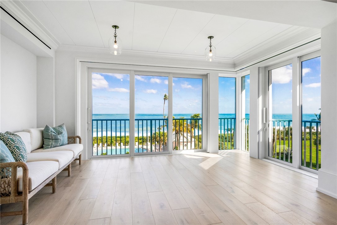 800 Beach Road, Unit 372 Indian River Shores, FL 32963 - Photo 6 of 35 a view of livingroom with furniture and floor to ceiling window