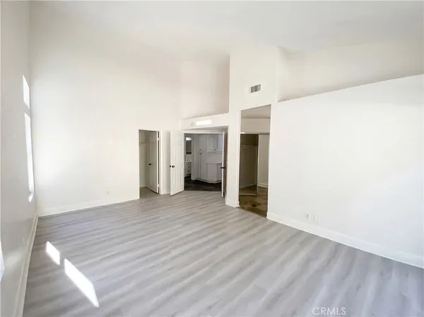 a view of a livingroom with wooden floor