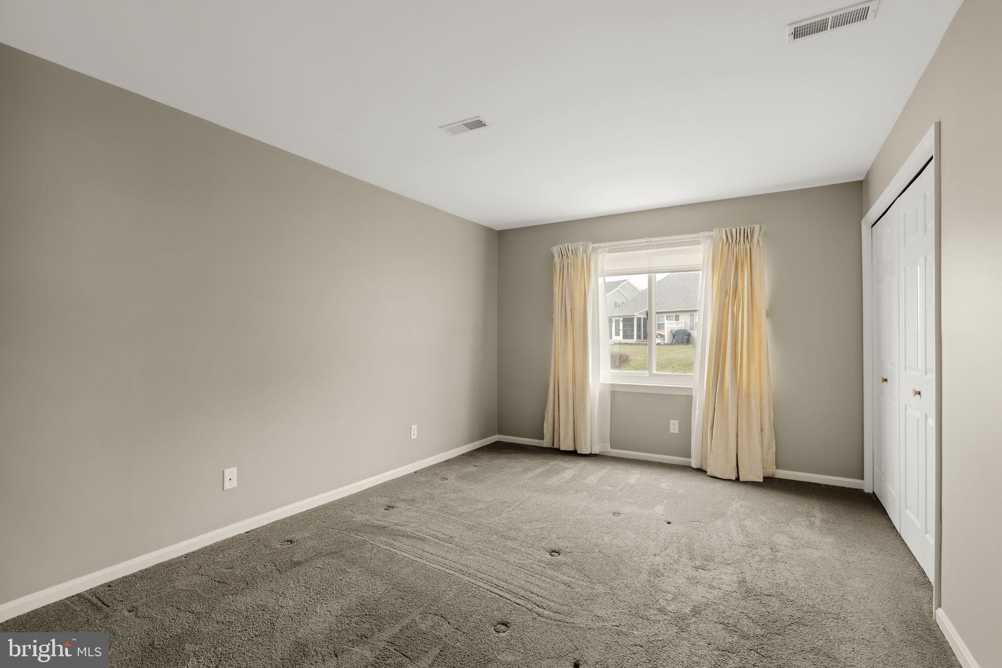 136 Bridle Path New Holland, PA 17557 - Photo 11 of 38 a view of an empty room with a window