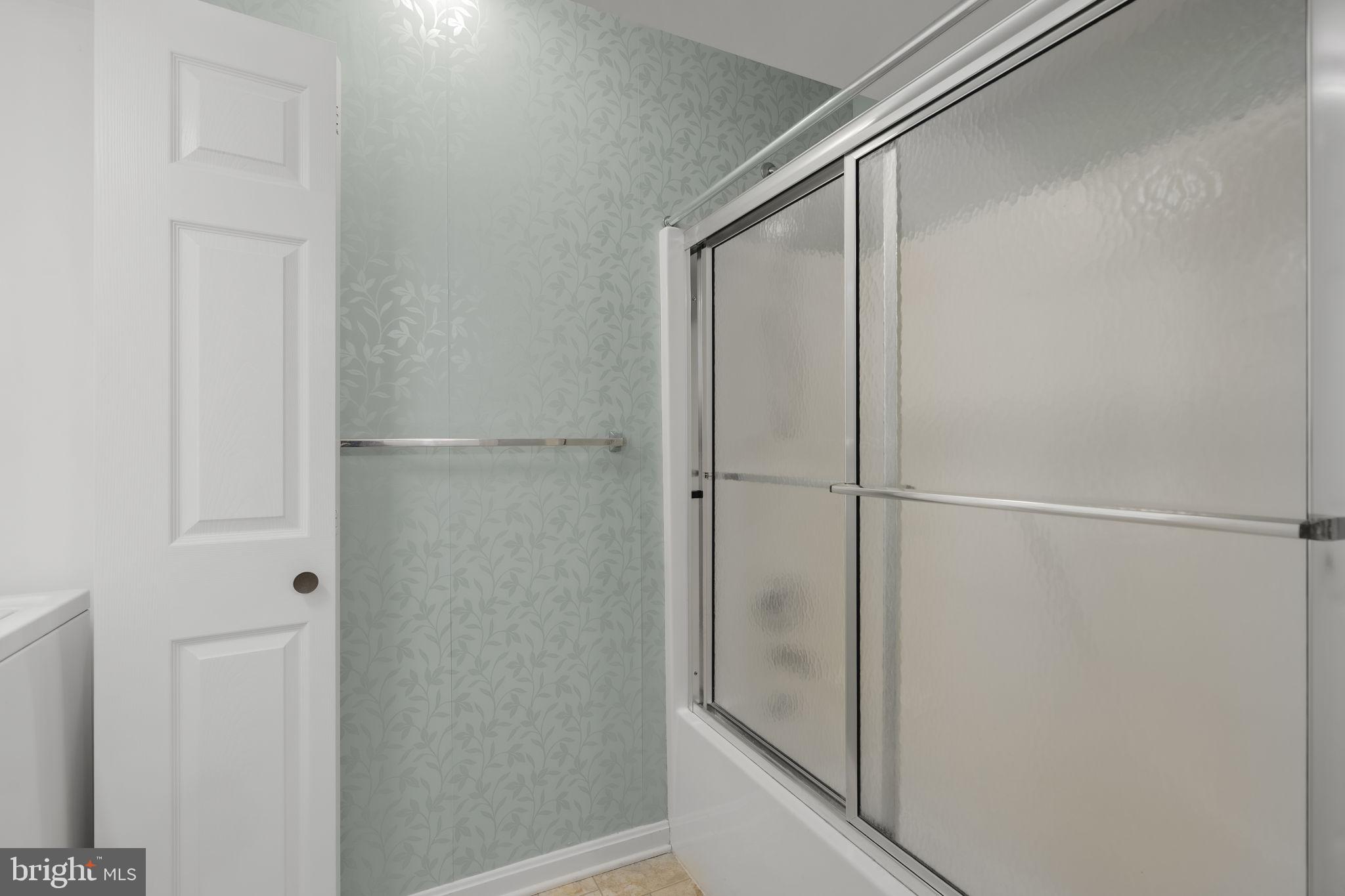 136 Bridle Path New Holland, PA 17557 - Photo 15 of 38 a bathroom with a glass shower door