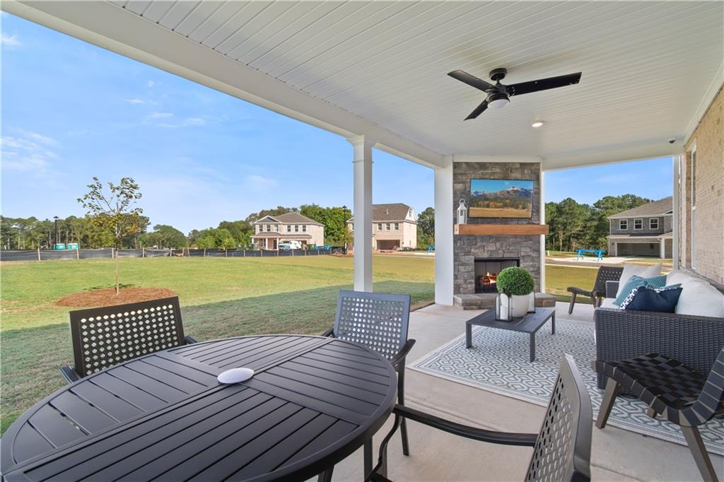 200 Chiswick Loop Stockbridge, GA 30281 - Photo 22 of 44 a view of a balcony with furniture and a lake view