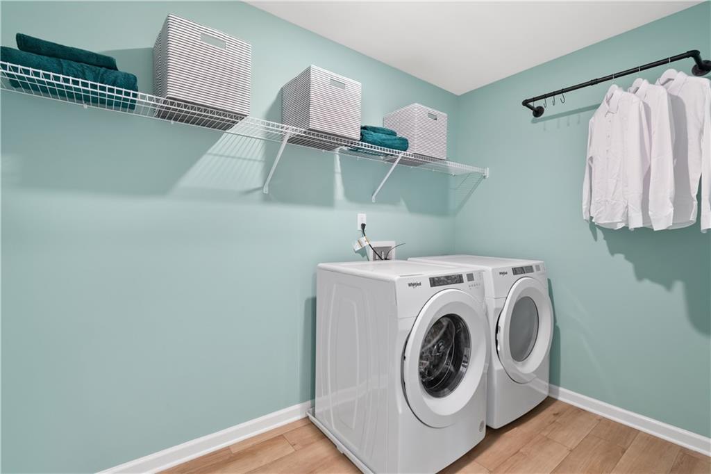 200 Chiswick Loop Stockbridge, GA 30281 - Photo 26 of 44 a utility room with dryer and washer