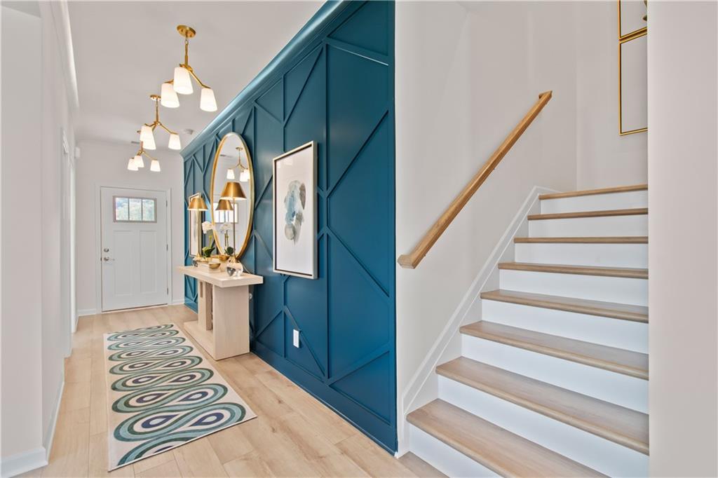200 Chiswick Loop Stockbridge, GA 30281 - Photo 9 of 44 a view of an entryway with wooden floor