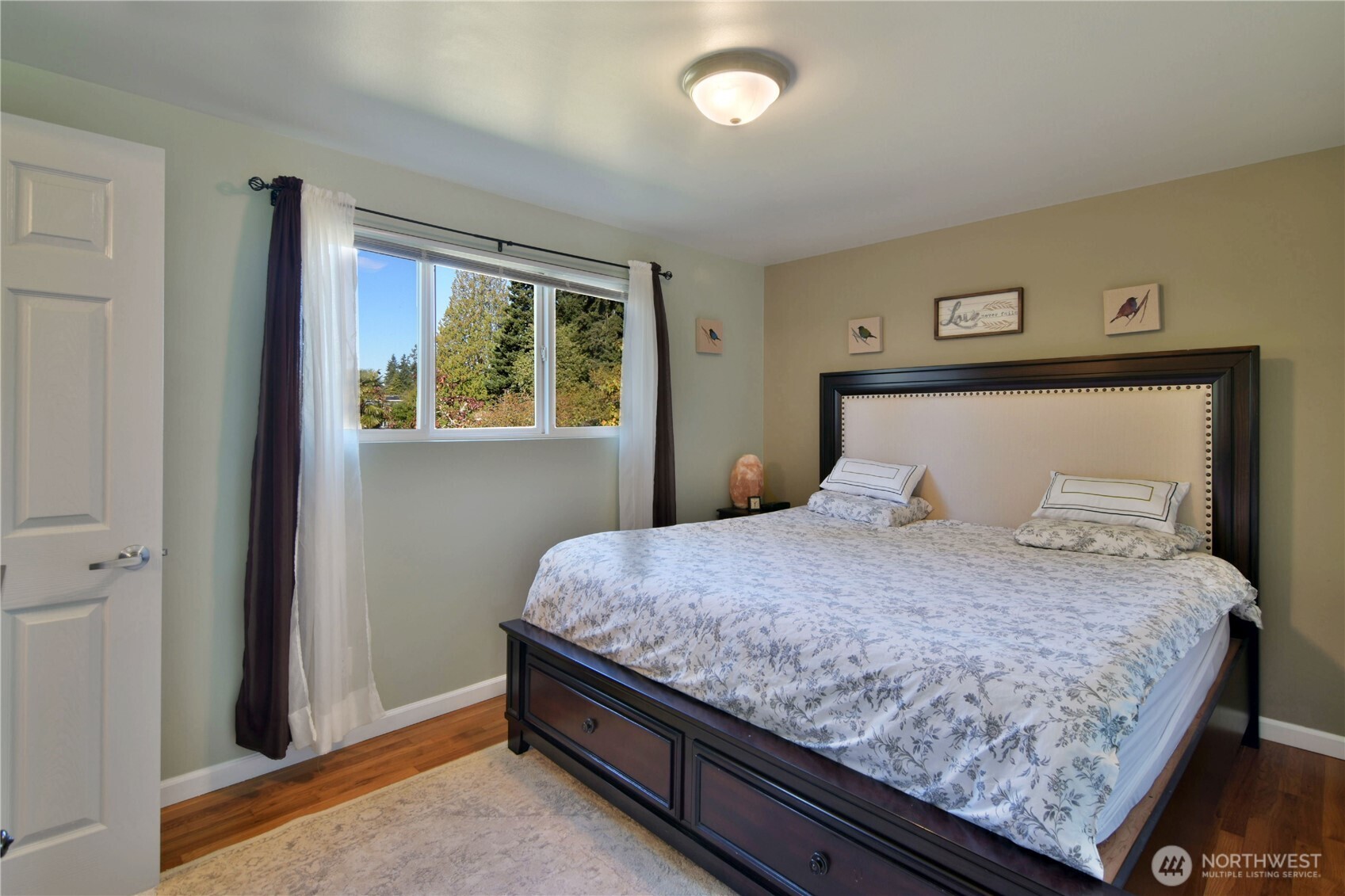 23116 80th Place West Edmonds, WA 98026 - Photo 14 of 34 a bedroom with a bed and window