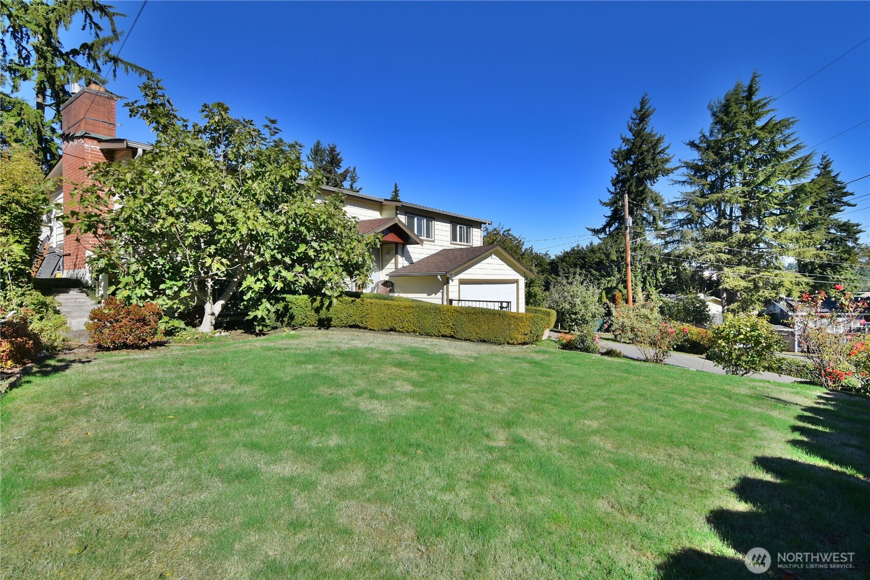 23116 80th Place West Edmonds, WA 98026 - Photo 2 of 34 a view of a house with a yard