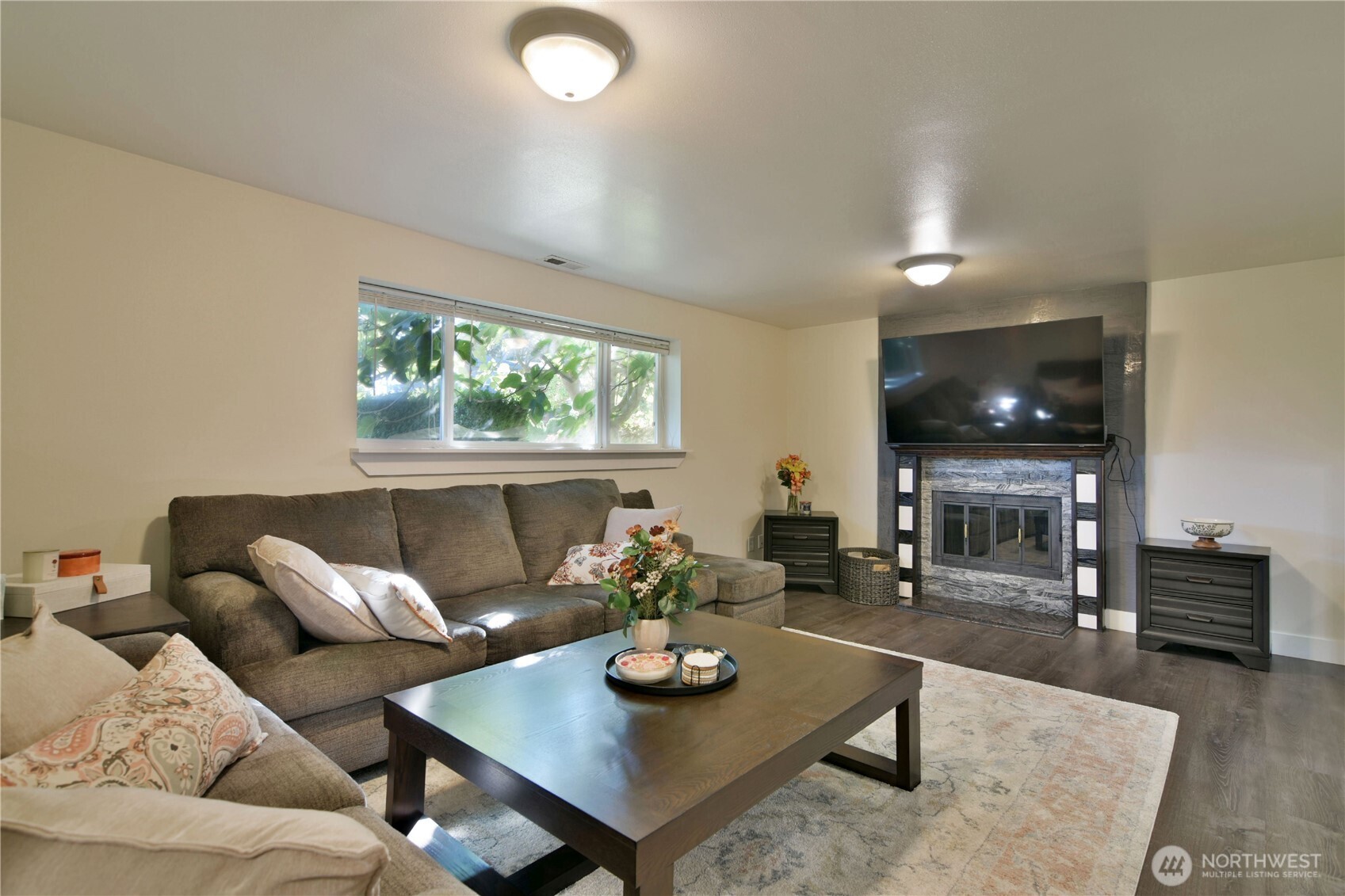 23116 80th Place West Edmonds, WA 98026 - Photo 24 of 34 a living room with furniture and a flat screen tv