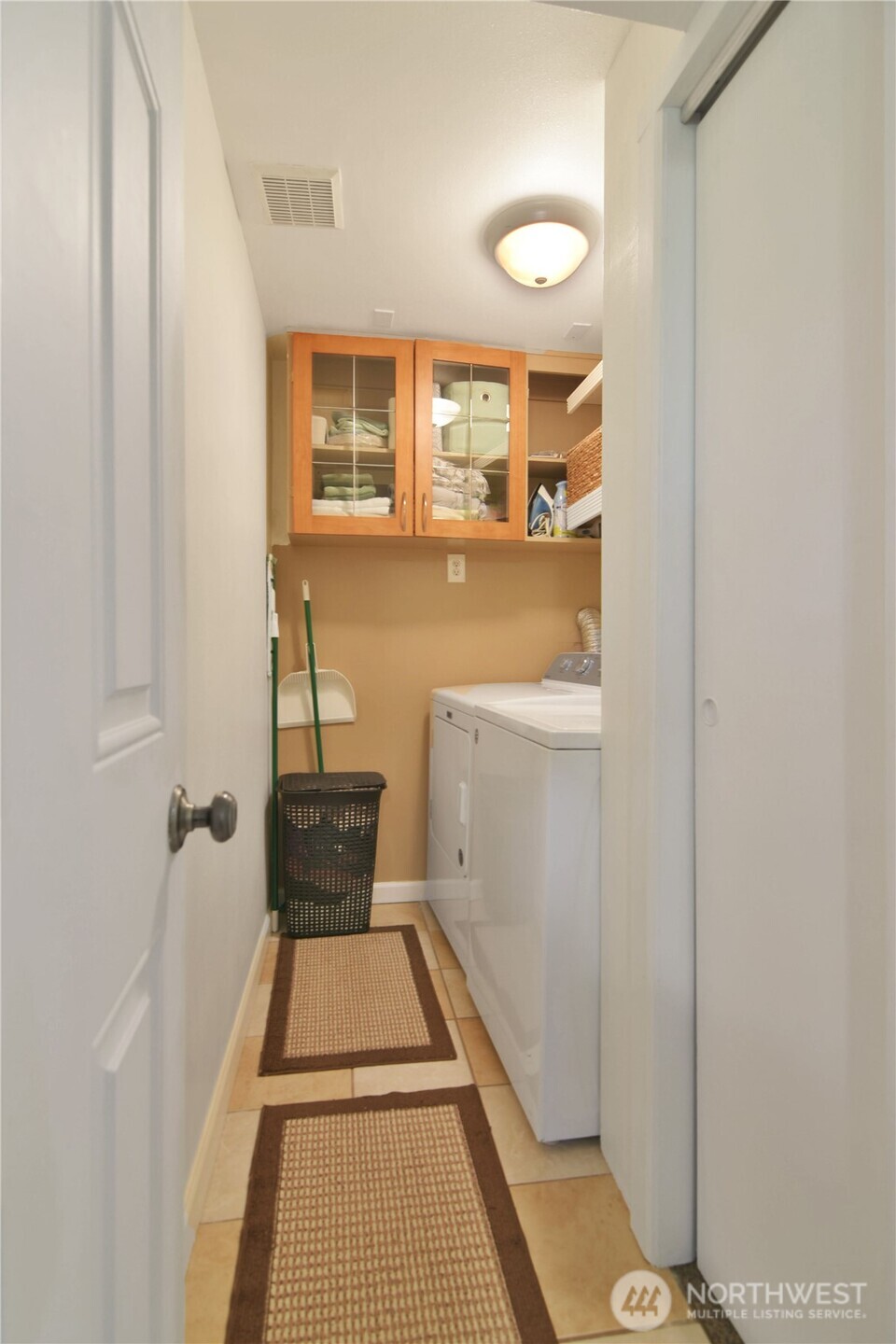 23116 80th Place West Edmonds, WA 98026 - Photo 31 of 34 a bathroom with a sink and a mirror