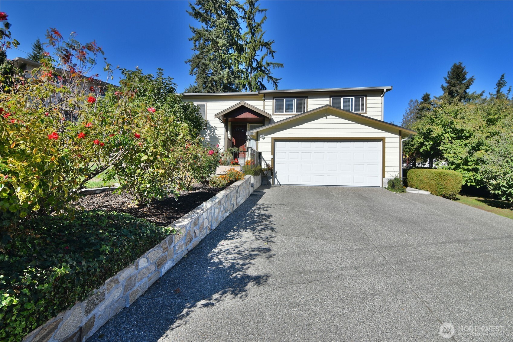 23116 80th Place West Edmonds, WA 98026 - Photo 34 of 34 a front view of a house with a yard and garage
