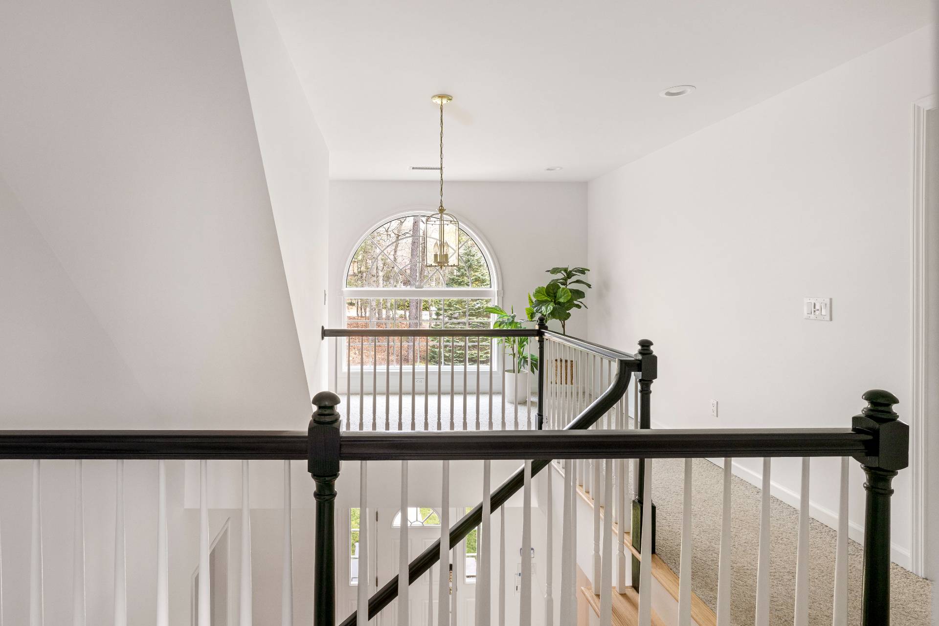 28 Quail Run Hampton Bays, NY 11946 - Photo 16 of 22 a view of staircase with wooden floor