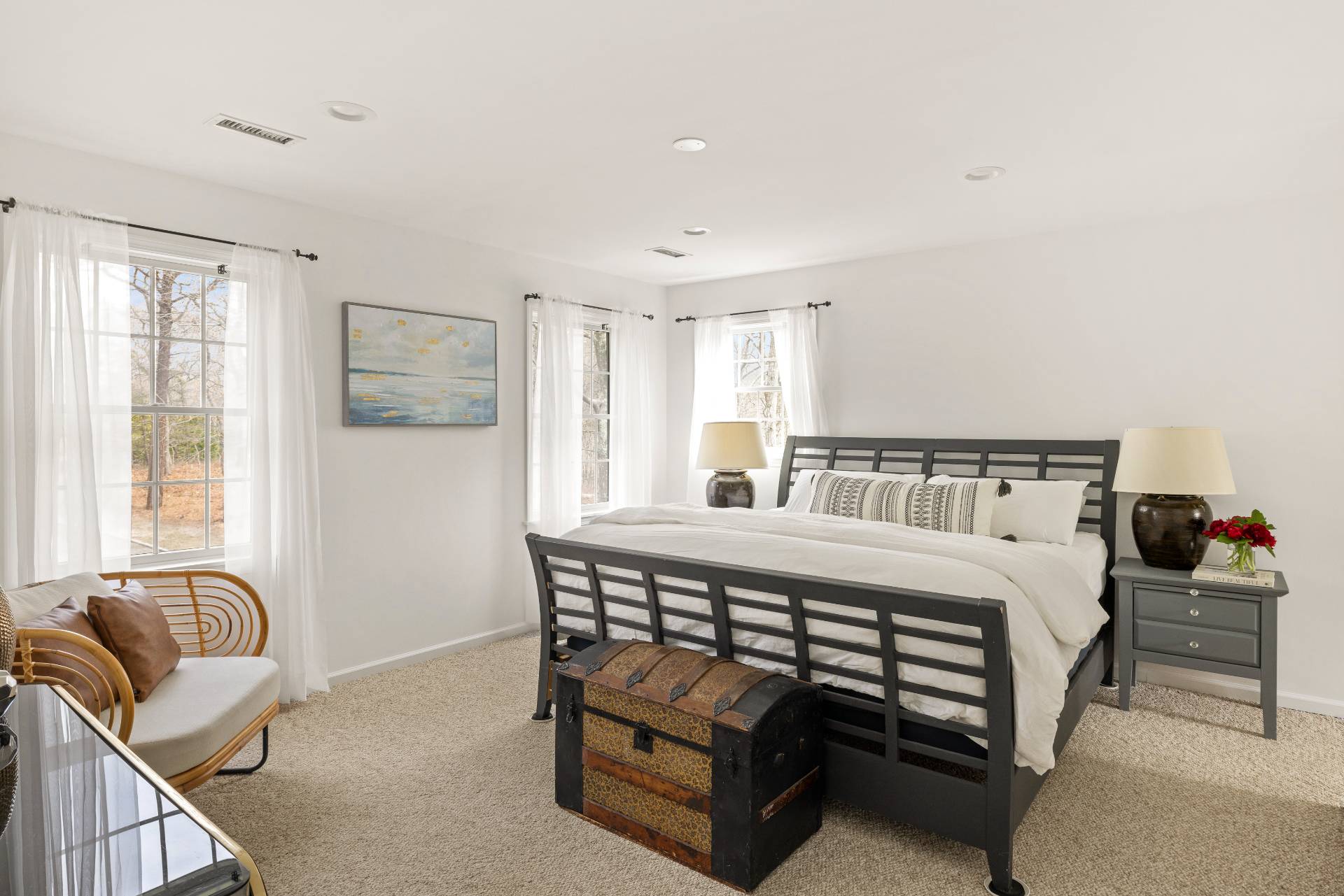 28 Quail Run Hampton Bays, NY 11946 - Photo 17 of 22 a bedroom with a bed and wooden floor