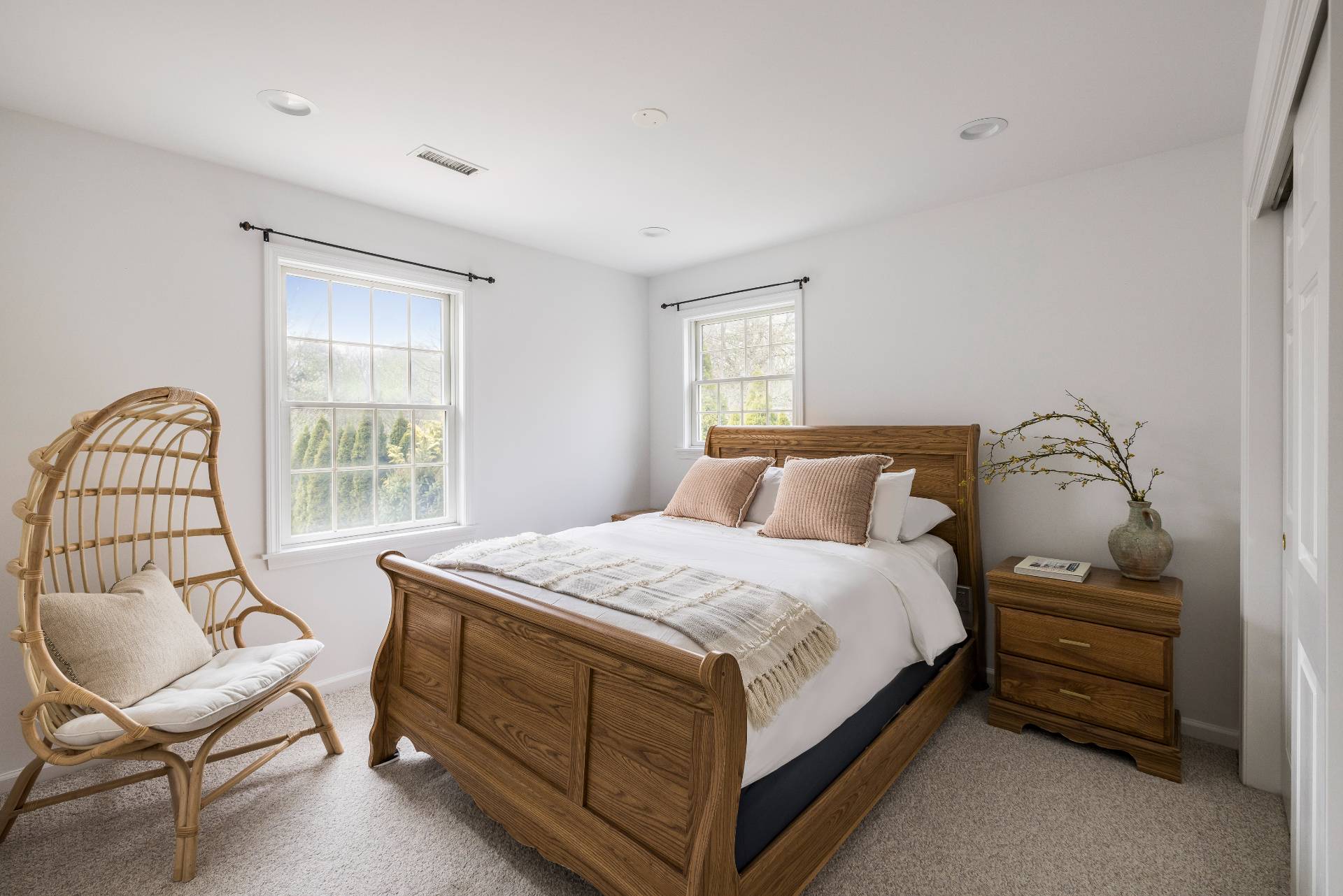 28 Quail Run Hampton Bays, NY 11946 - Photo 20 of 22 a bedroom with a bed chair and window