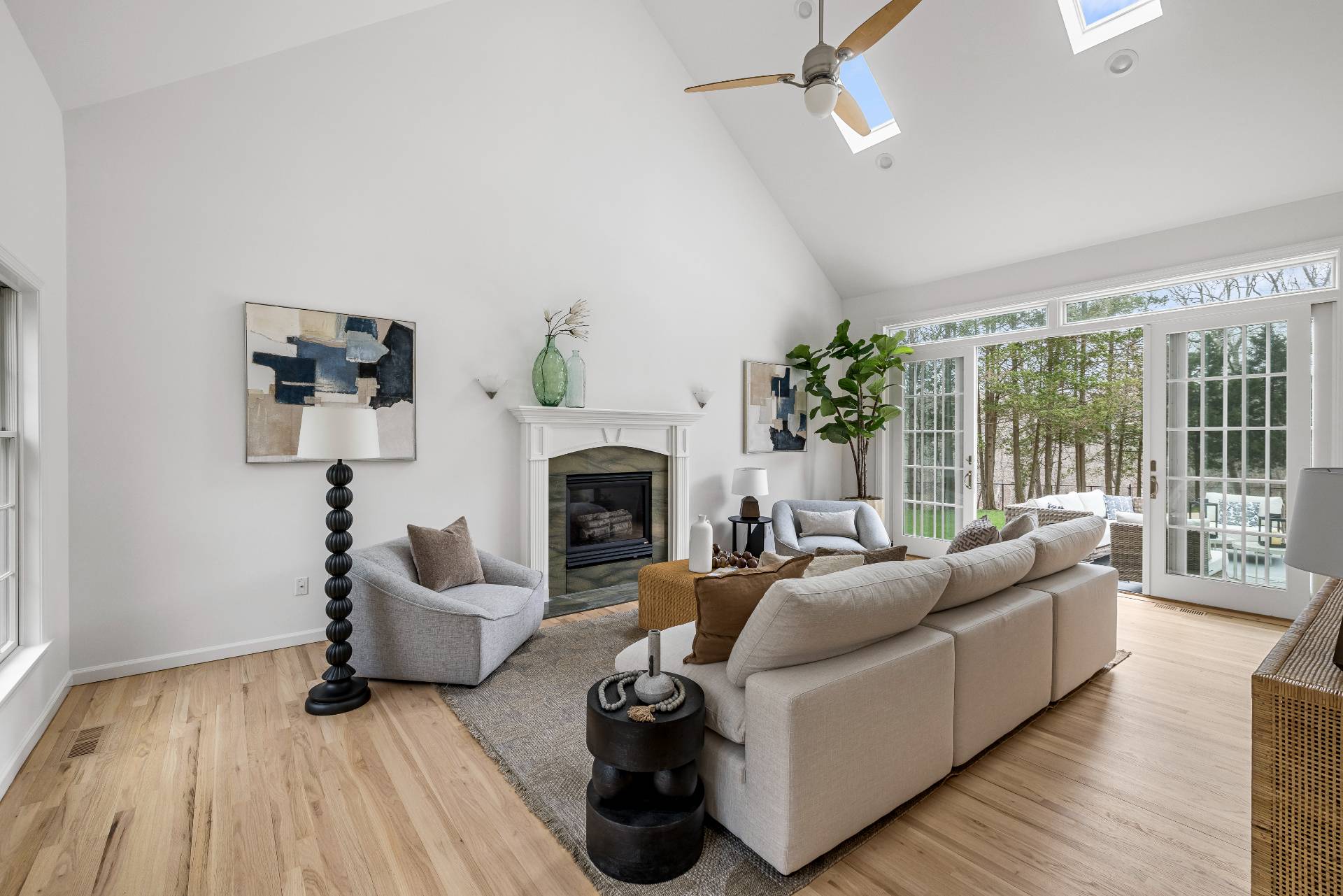 28 Quail Run Hampton Bays, NY 11946 - Photo 5 of 22 a living room with furniture and a fireplace