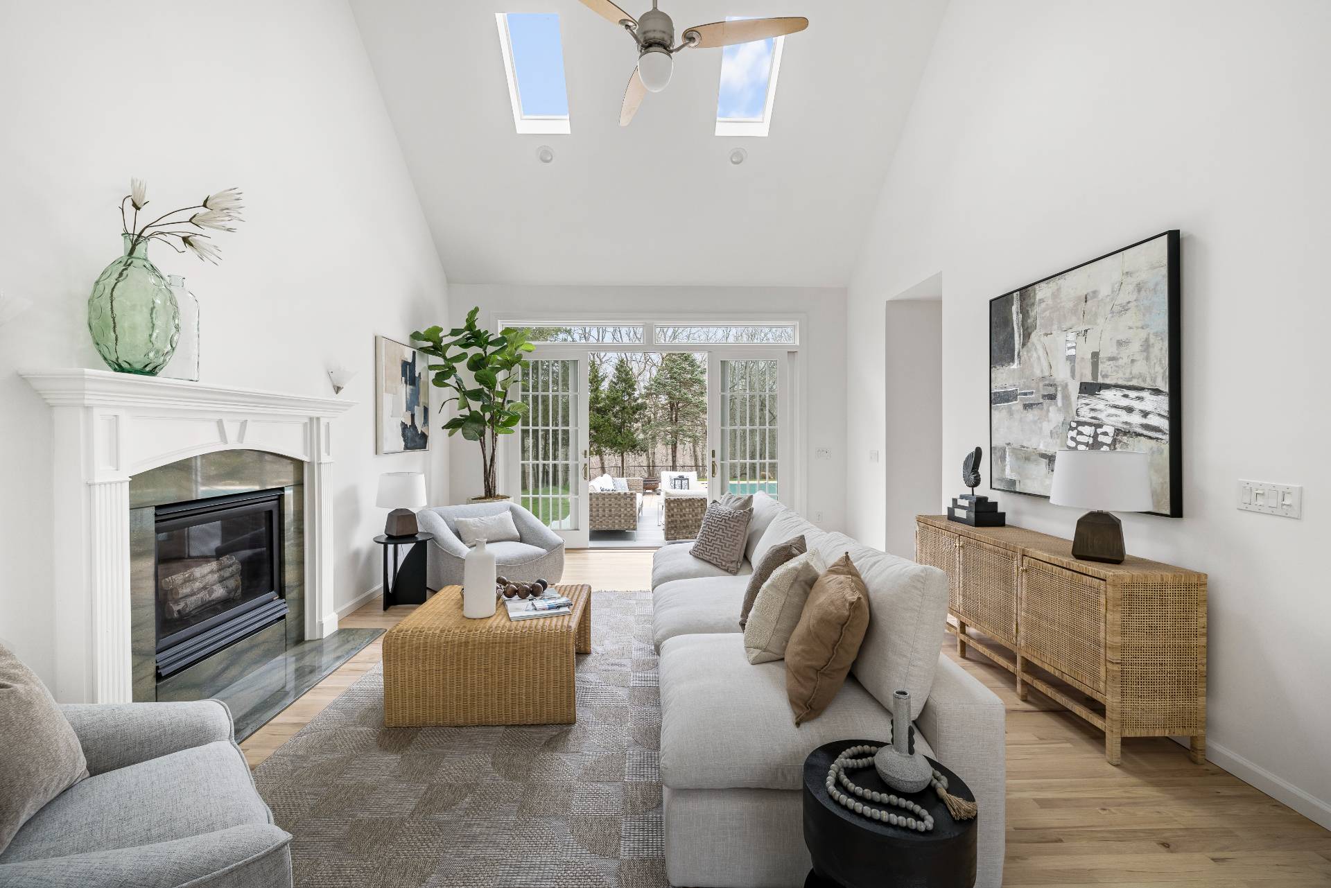 28 Quail Run Hampton Bays, NY 11946 - Photo 6 of 22 a living room with furniture fireplace and flat screen tv