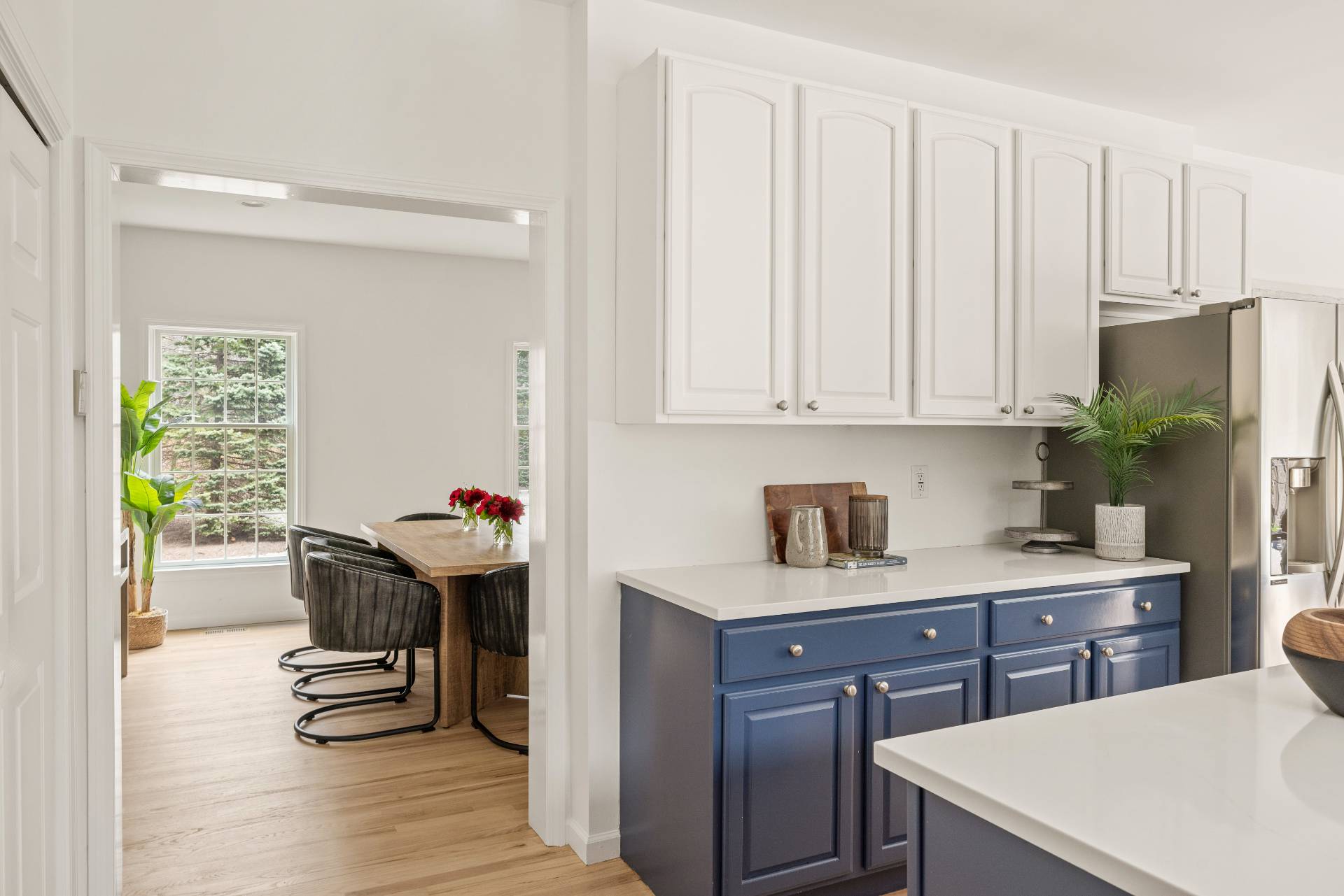 28 Quail Run Hampton Bays, NY 11946 - Photo 10 of 22 a kitchen with a sink cabinets and wooden floor