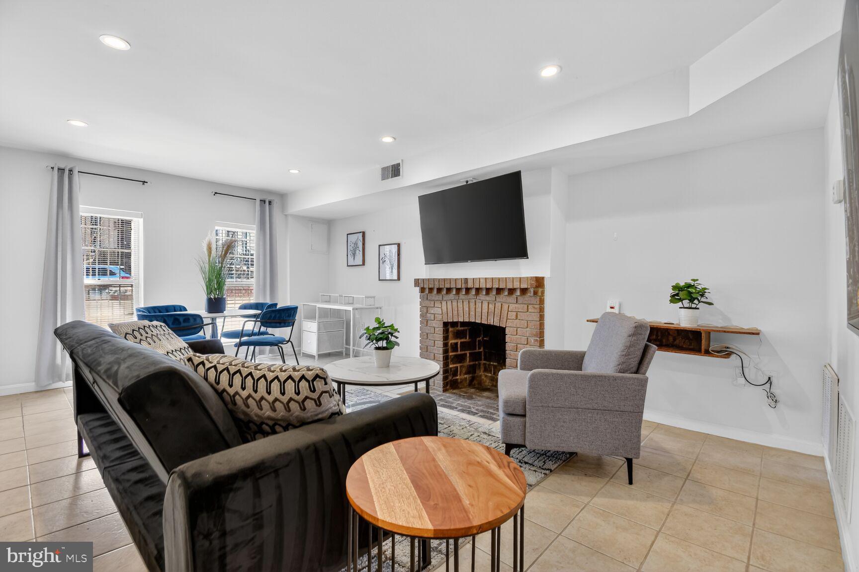 1339 Corcoran Street Northwest, Unit B Washington, DC 20009 - Photo 1 of 16 Living Room with Full Size Windows Allowing Sun