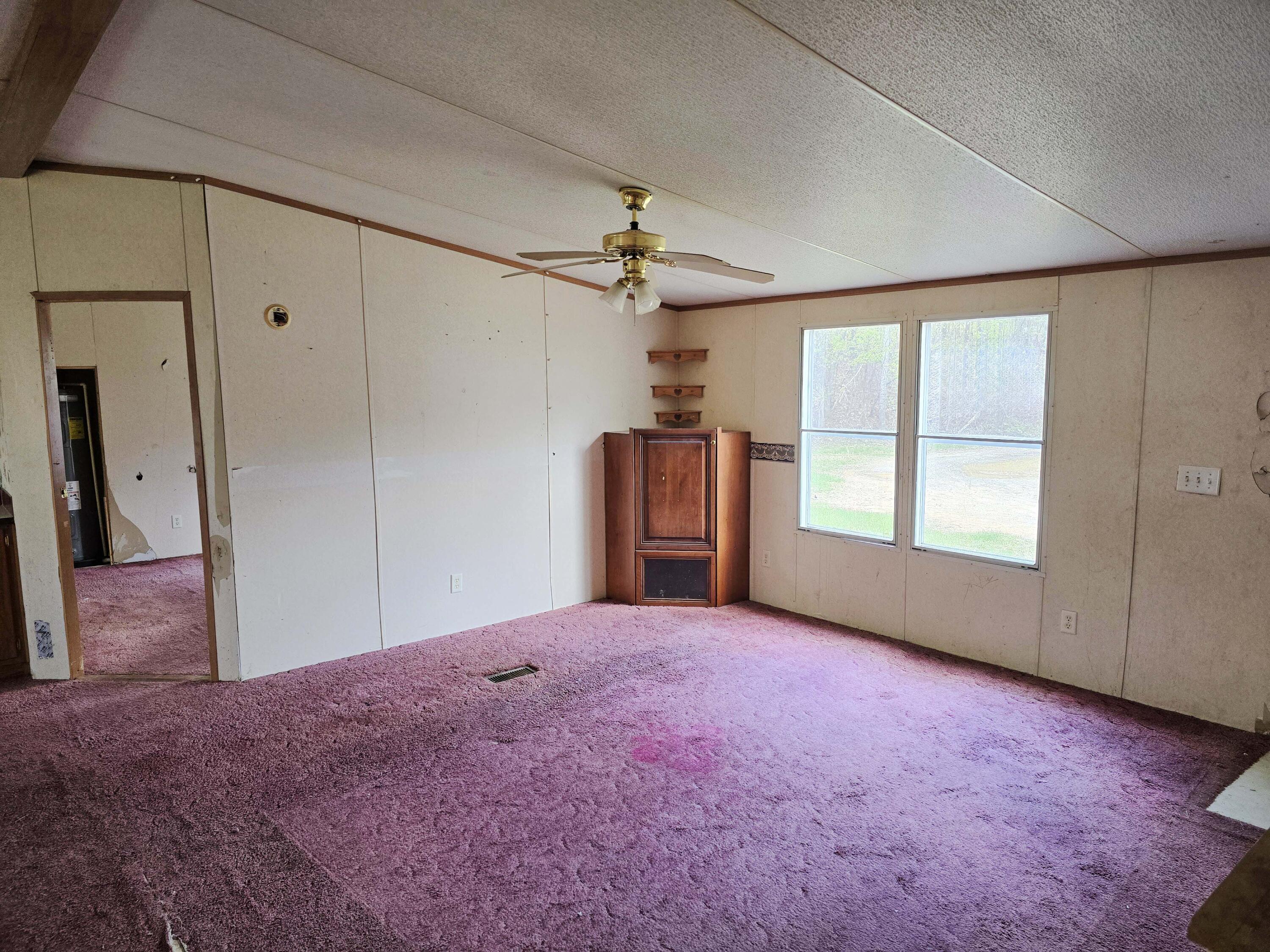 1188 Easter Lane Blue Ridge, VA 24064 - Photo 15 of 33 a view of a big room with windows and cabinet