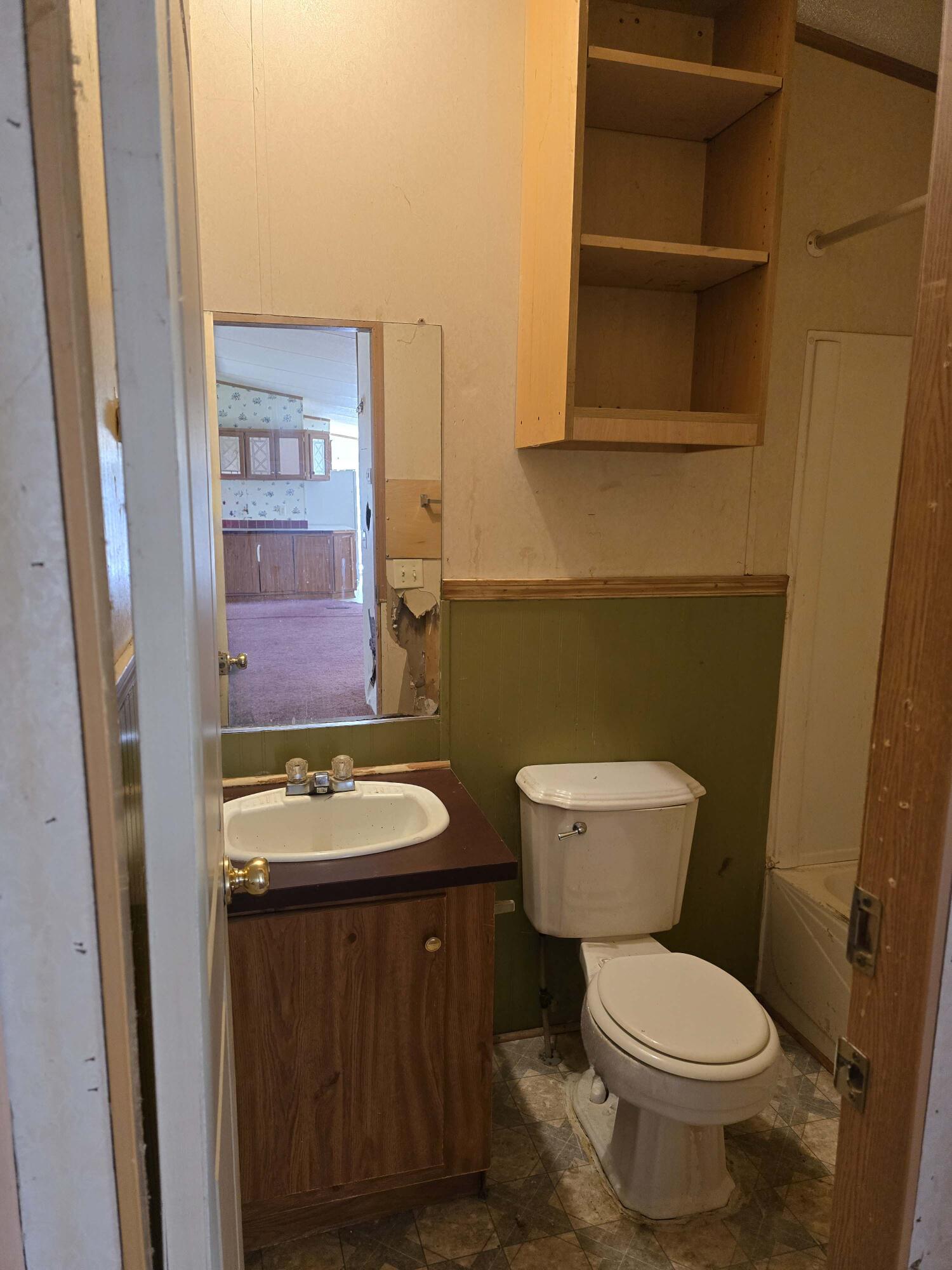 1188 Easter Lane Blue Ridge, VA 24064 - Photo 23 of 33 a bathroom with a toilet and a sink