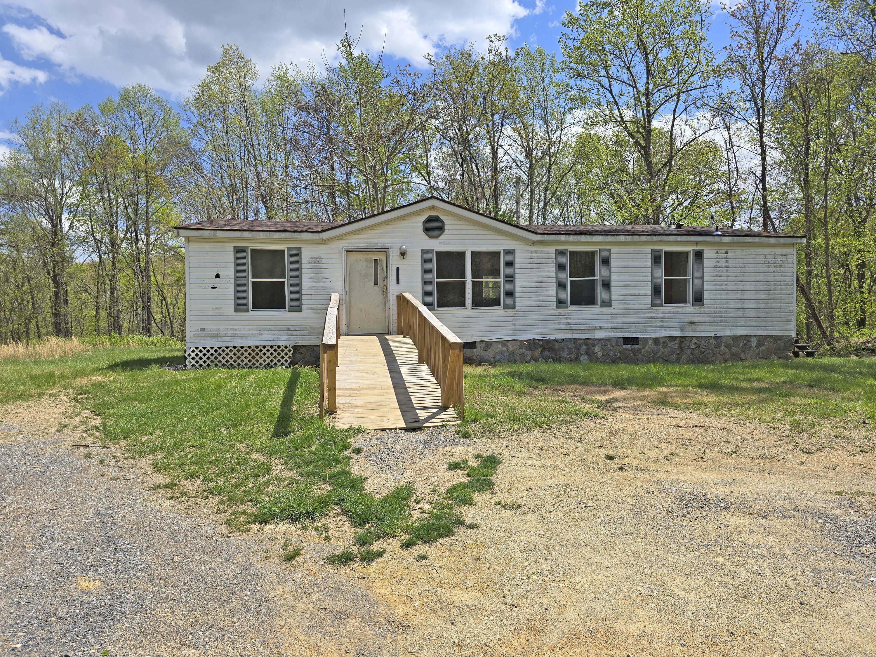 1188 Easter Lane Blue Ridge, VA 24064 - Photo 3 of 33 a view of a house with a yard