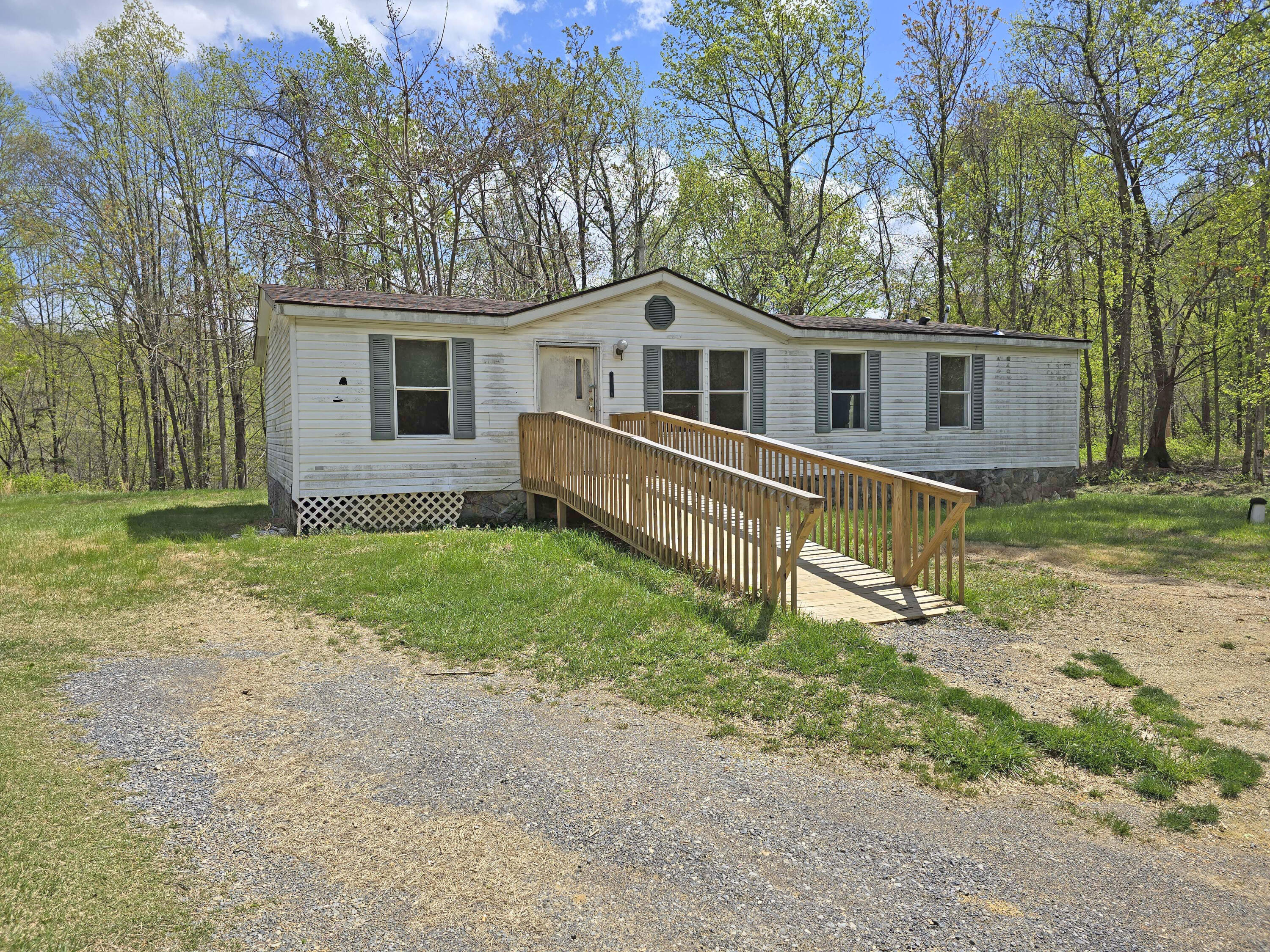 1188 Easter Lane Blue Ridge, VA 24064 - Photo 4 of 33 a view of a house with a yard