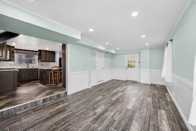 a view of kitchen with wooden floor