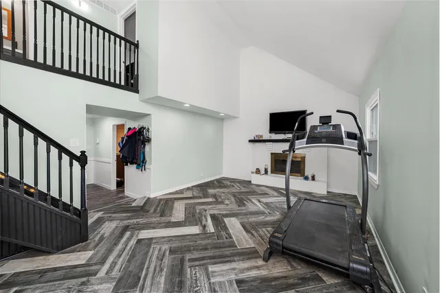 a view of a living room and entryway
