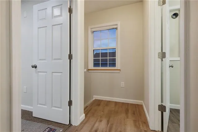 an empty room with windows