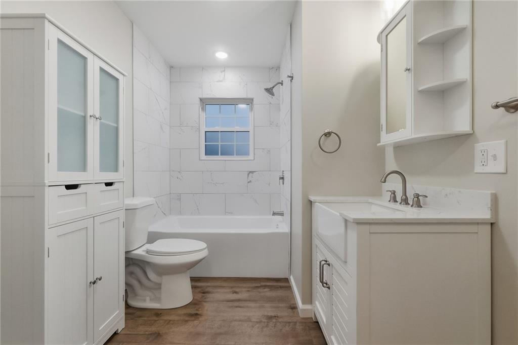 612 Virginia Avenue Rochester, PA 15074 - Photo 30 of 36 a bathroom with a sink toilet and shower