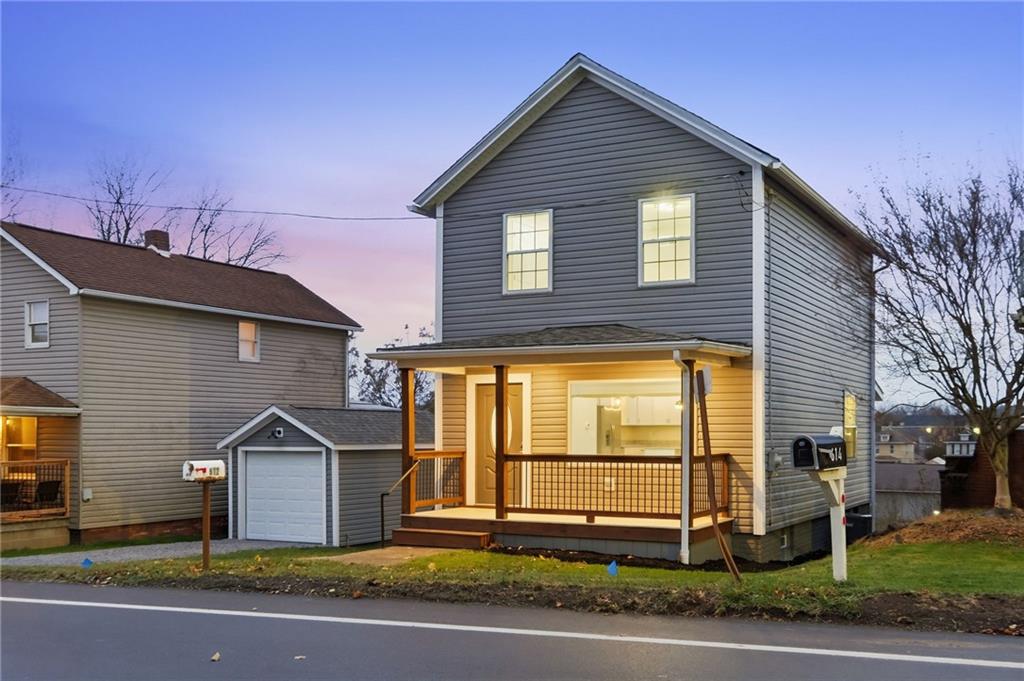 612 Virginia Avenue Rochester, PA 15074 - Photo 3 of 36 a front view of a house with a yard