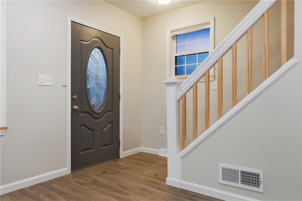 612 Virginia Avenue Rochester, PA 15074 - Photo 6 of 36 a view of an entryway with wooden floor
