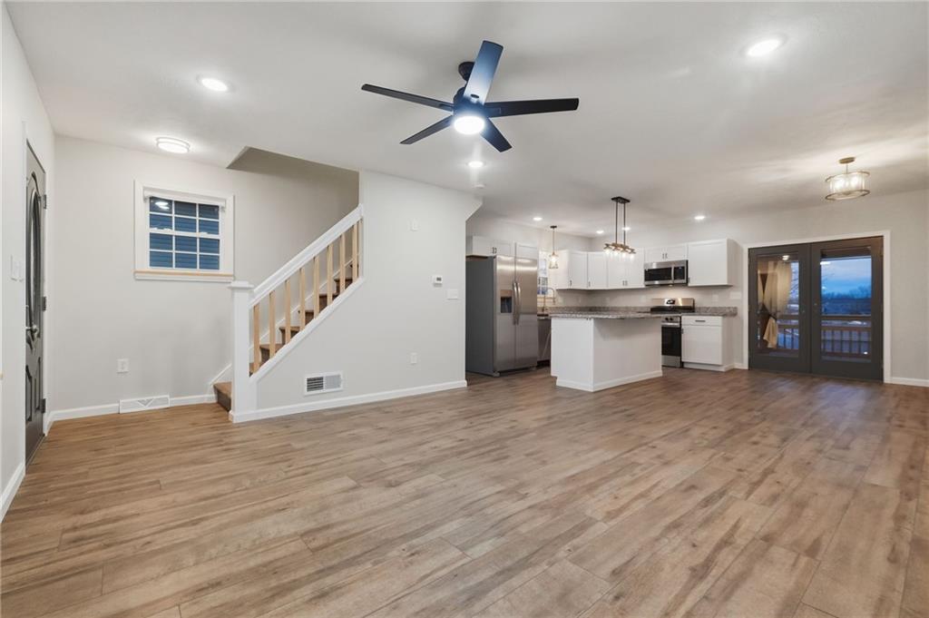 612 Virginia Avenue Rochester, PA 15074 - Photo 8 of 36 a view of a kitchen with a sink and a stove top oven