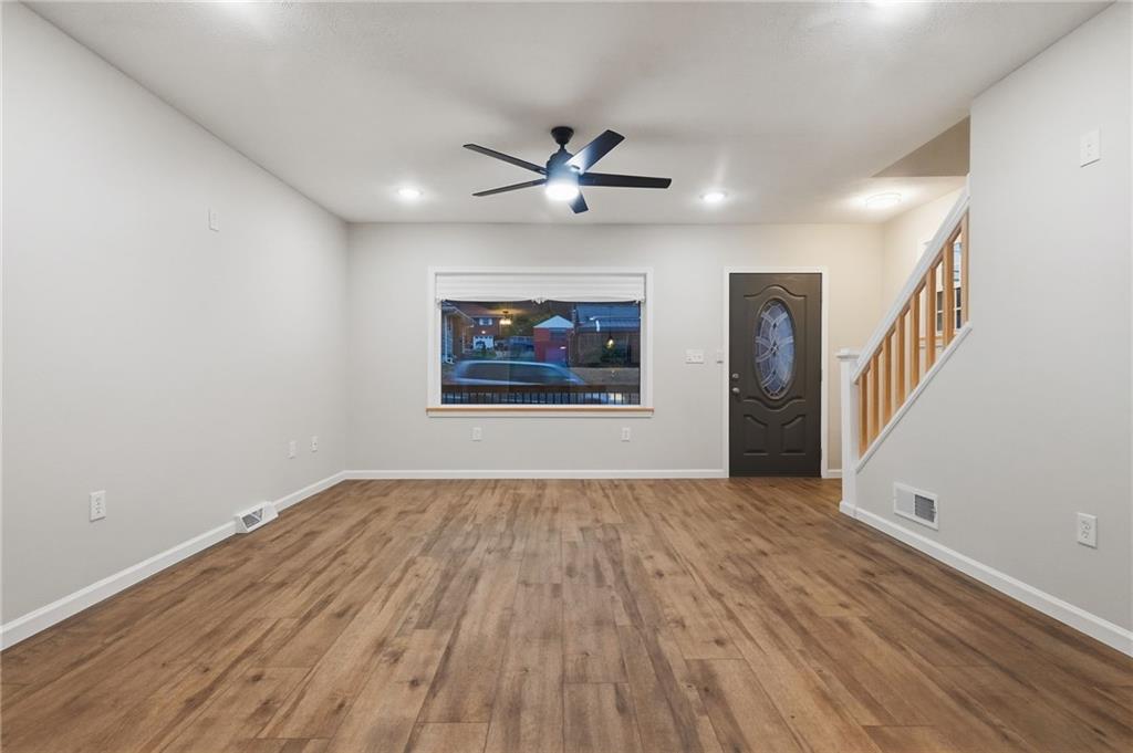 612 Virginia Avenue Rochester, PA 15074 - Photo 10 of 36 wooden floor in an empty room with a window