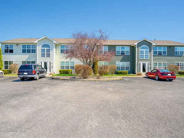 a car parked in front of a house