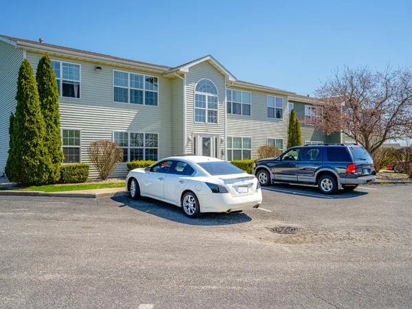 a car parked in front of a house